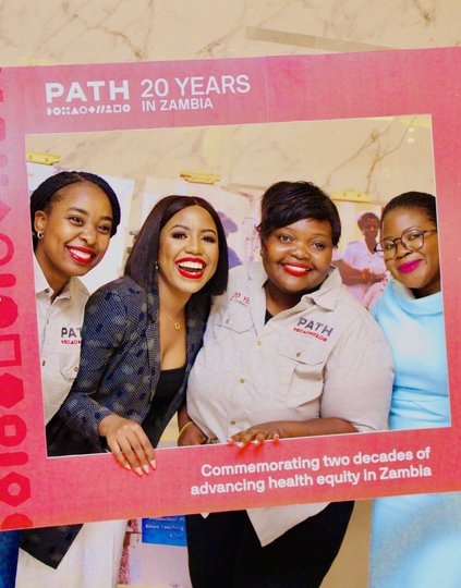 PATH staff Inutu Kanyama, Leah Sakala, Wanga Katiba, and Sintha Chiumia at the 20th-anniversary event. Over the past two decades, PATH has been a catalyst for health equity in Zambia. Photo: PATH/Mundia Masuzyo.