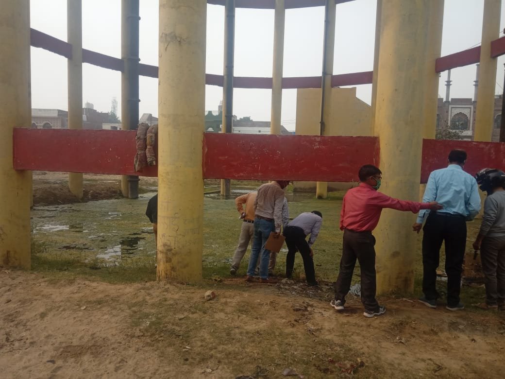 3. Health workers inspect urban mosquito breeding sites to prevent vector-borne diseases