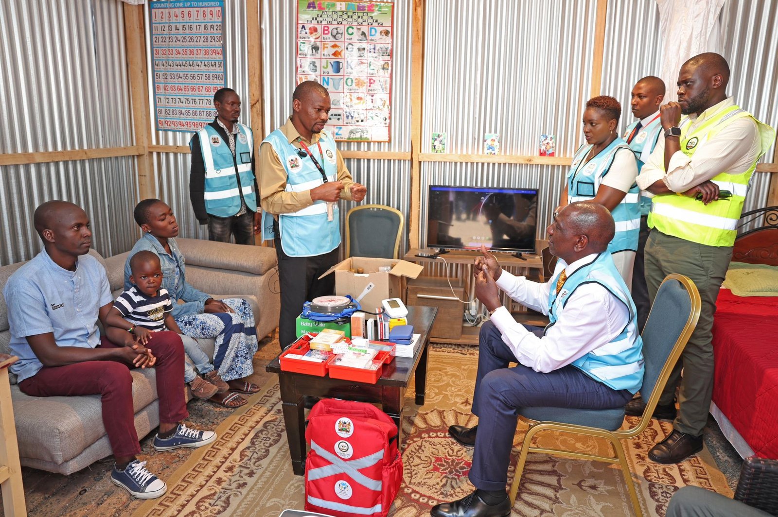 Kenyan President William Ruto (right seated) during the commissioning ceremony for the recently trained Primary Care Network master trainers.