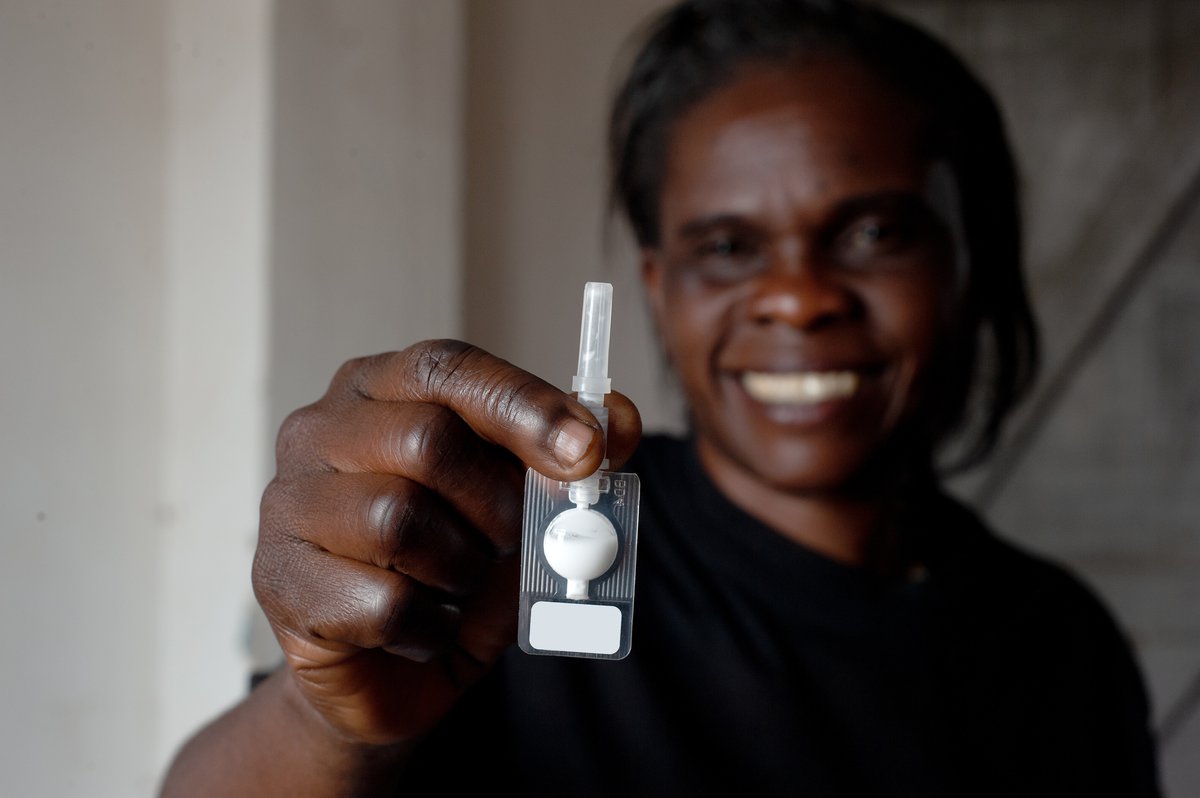 A woman in Uganda holds the injectable contraceptive, subcutaneous DMPA (DMPA-SC). PATH/Will Boase.