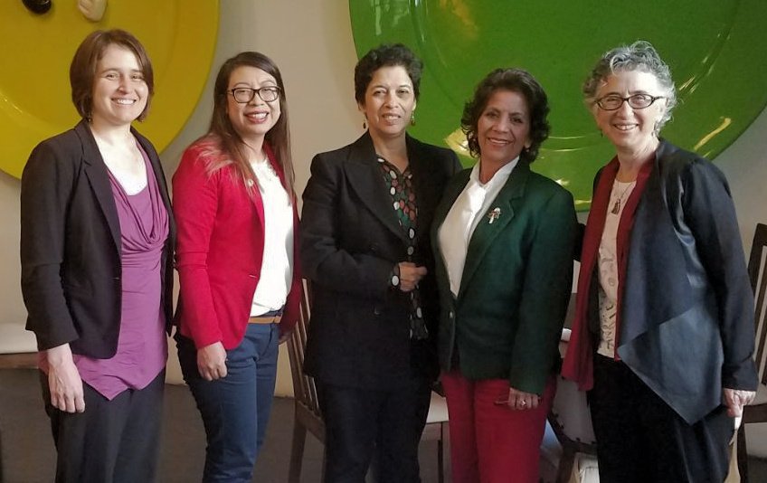 Silvia de Sanjosé and four colleagues standing together.