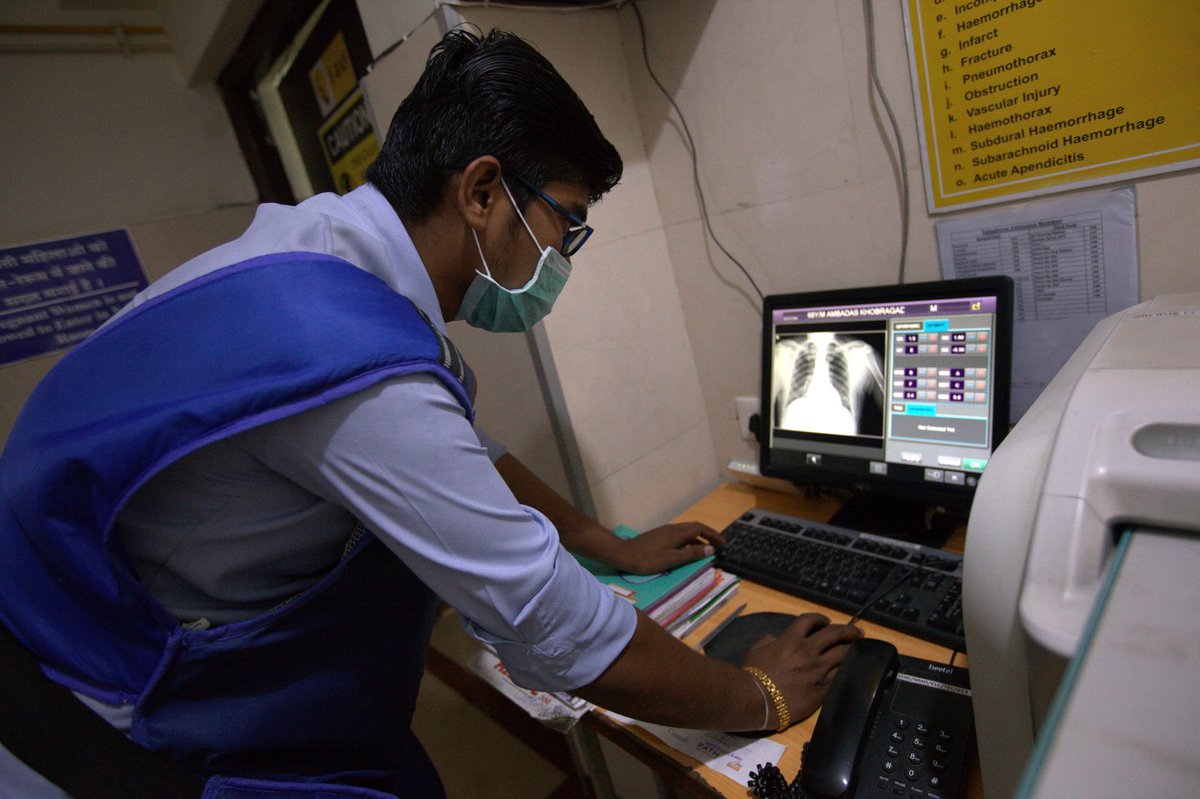 A technician at a chest x-ray laboratory in Nagpur, India, updates patient details in a computer-aided detection software program before running a cloud-based artificial intelligence screening for tuberculosis. Photo: Stop TB Partnership.