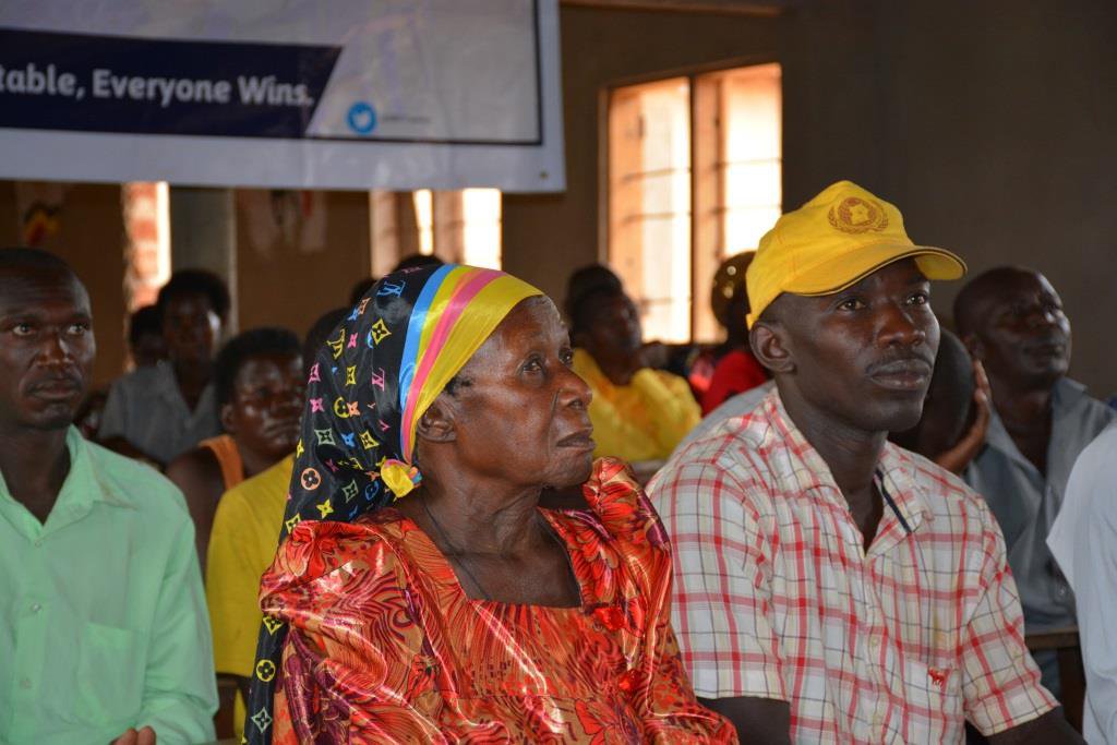 A room full of people looking forward.