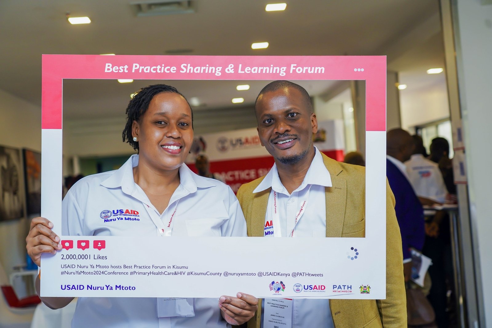 James Kiboche, Deputy Chief of Party for the USAID Nuru Ya Mtoto project, and Collete Torrorey, PATH’s Orphans and Vulnerable Children Program Officer, at the Best Practice Sharing and Learning Forum. Photo: PATH.