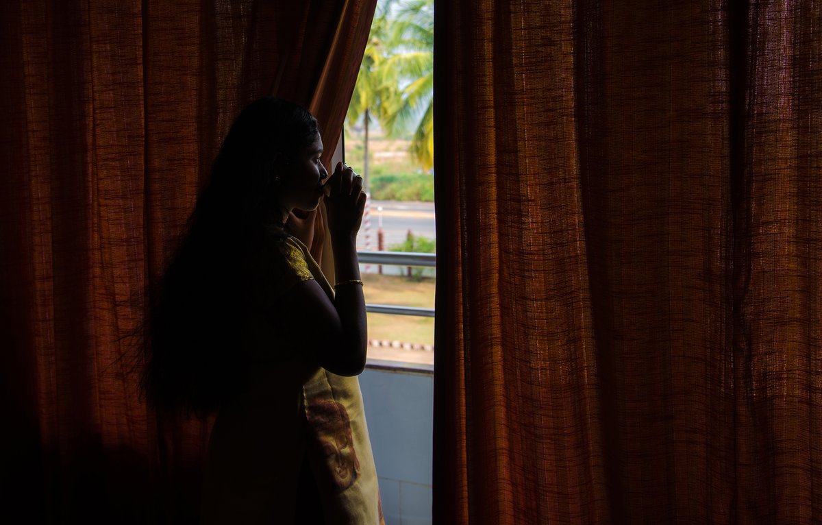 Indian girl in window with mug looking out. Photo: iStock/A. S. Padmanabhan/   iStock-882778238-India-girl-window-2000px.jpg