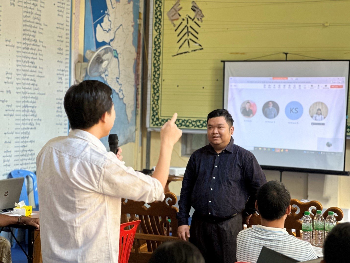Digital Square Senior Technical Officer Dr. Day Naing Aung discussing the township-level data management system with a focal person from an implementing partner at Myeik District Health Department, Tanintharyi Region. Photo: PATH/Han Lin Aung
