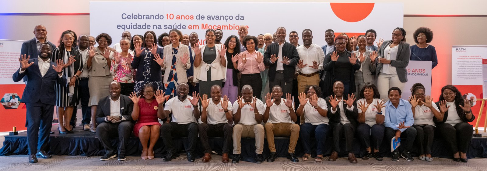 A group photo of PATH Staff, government officials and partners at the 10th anniversary event. Photo PATH/Paulo Alexandre.
