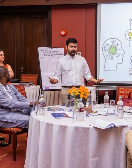 Dr Bilal Mateen, PATH's chief AI officer, delivering remarks on the future of AI in health care delivery.