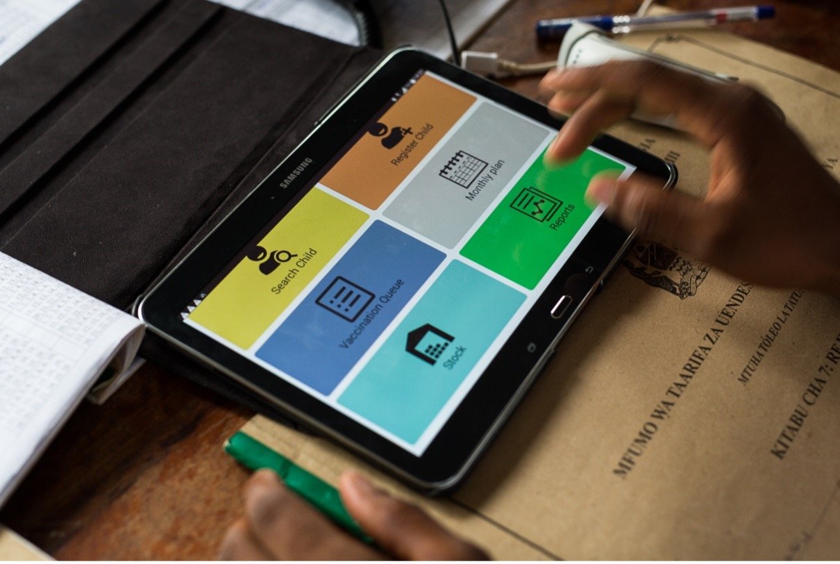 An immunization worker in Tanzania inputs data into the Tanzania Immunization Registry. Photo: PATH/Trevor Snapp.