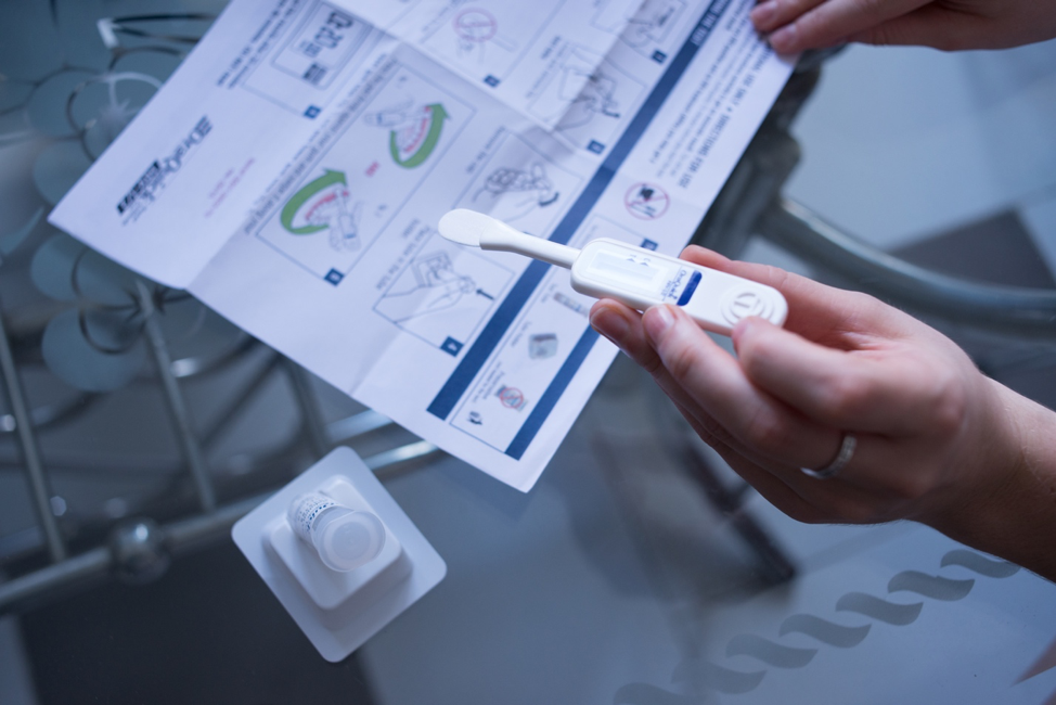 An HIV self-testing kit being distributed to a client in Vietnam. Photograph: PATH/Matthew Dakin.