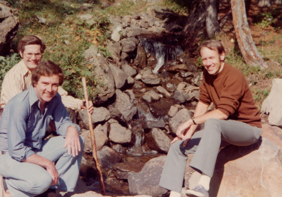 PATH’s three cofounders at a rocky stream.